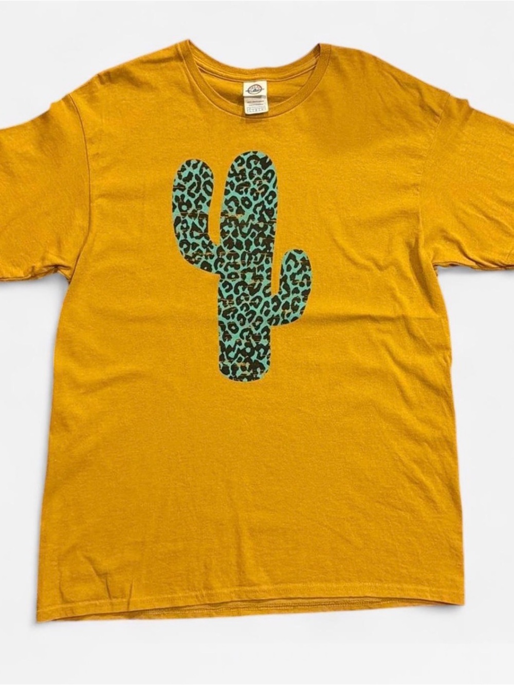 Delta Mustard Yellow Tee with Teal Leopard Cactus Graphic